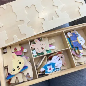 Erhalt eines Holzpuzzle zum Ankleiden vom Kunden M***a.